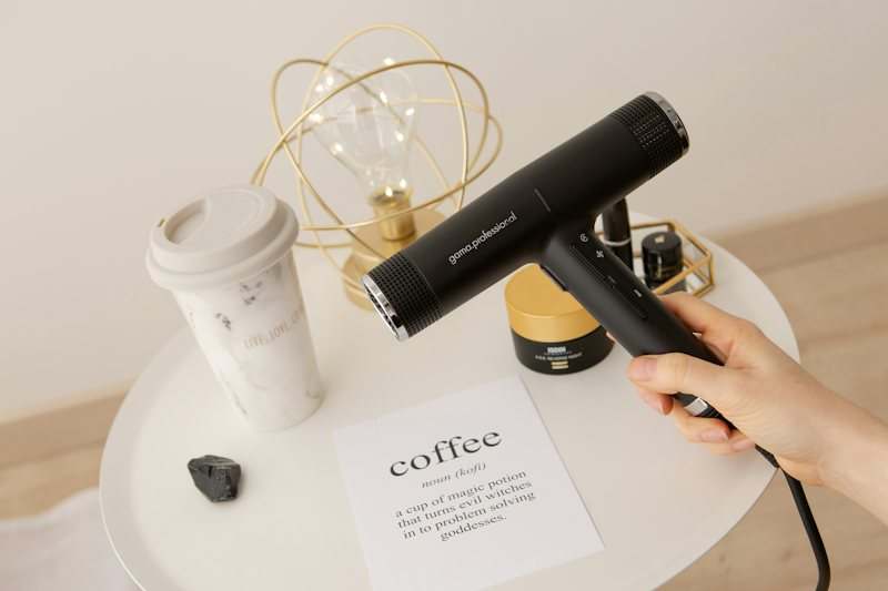 A professional hair dryer ready for an in-home appointment